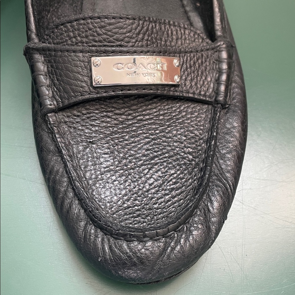 Coach Black Textured Leather Slip-Ons
